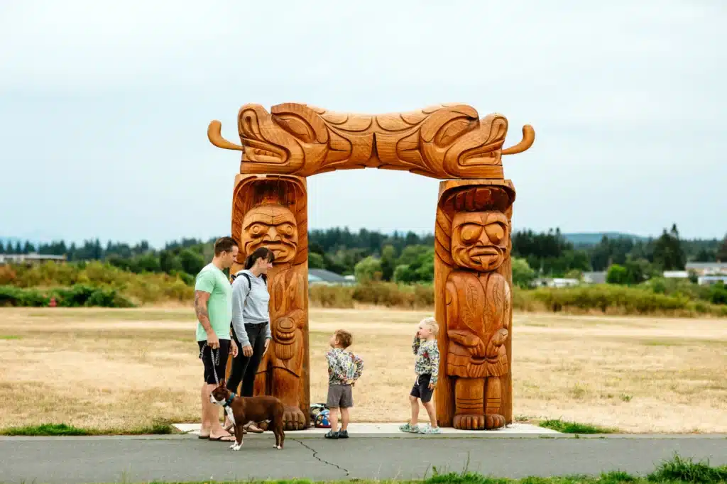 Visitors with Arch on ʔuxstalis Tyee Spit | Bluetree Photography | Destination Campbell River
