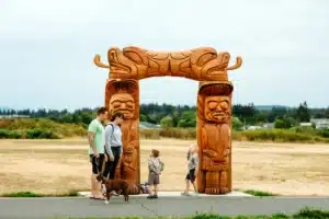 Visitors with Arch on ʔuxstalis Tyee Spit | Bluetree Photography | Destination Campbell River